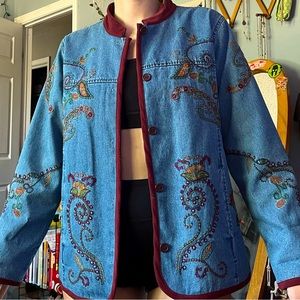 Has a windbreaker type lining and is much lighter than a typical jean jacket.